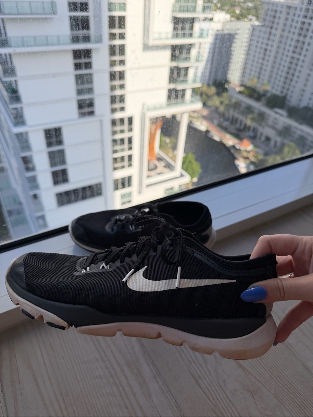 Nike Women's Black Athletic Trainers with White Swoosh